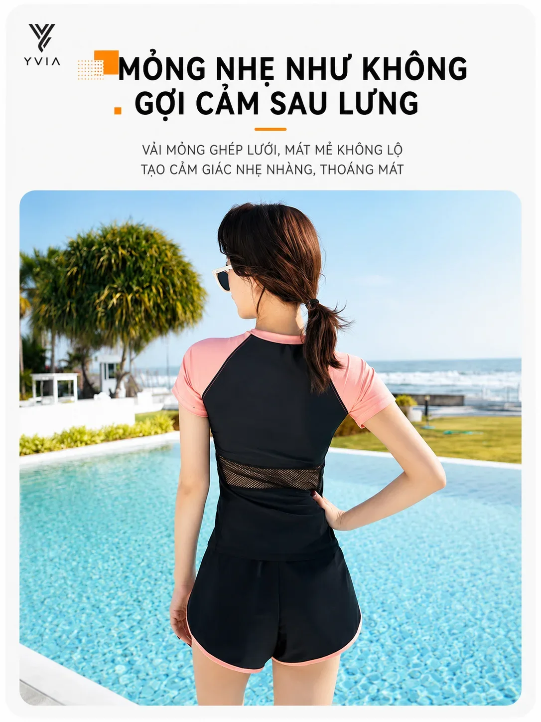 Bộ đồ bơi áo và quần ngắn màu đen với điểm nhấn tay màu nổi và lớp lưới mỏng gợi cảm sau lưng – ảnh 3